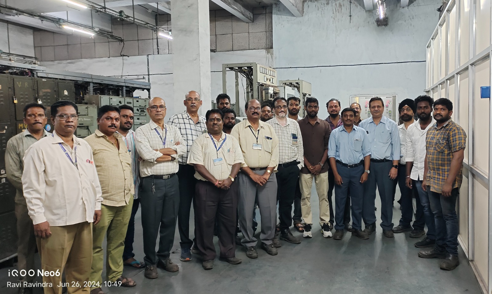 Wide field view of a completed substation facility with switchgear yard and transmission lines